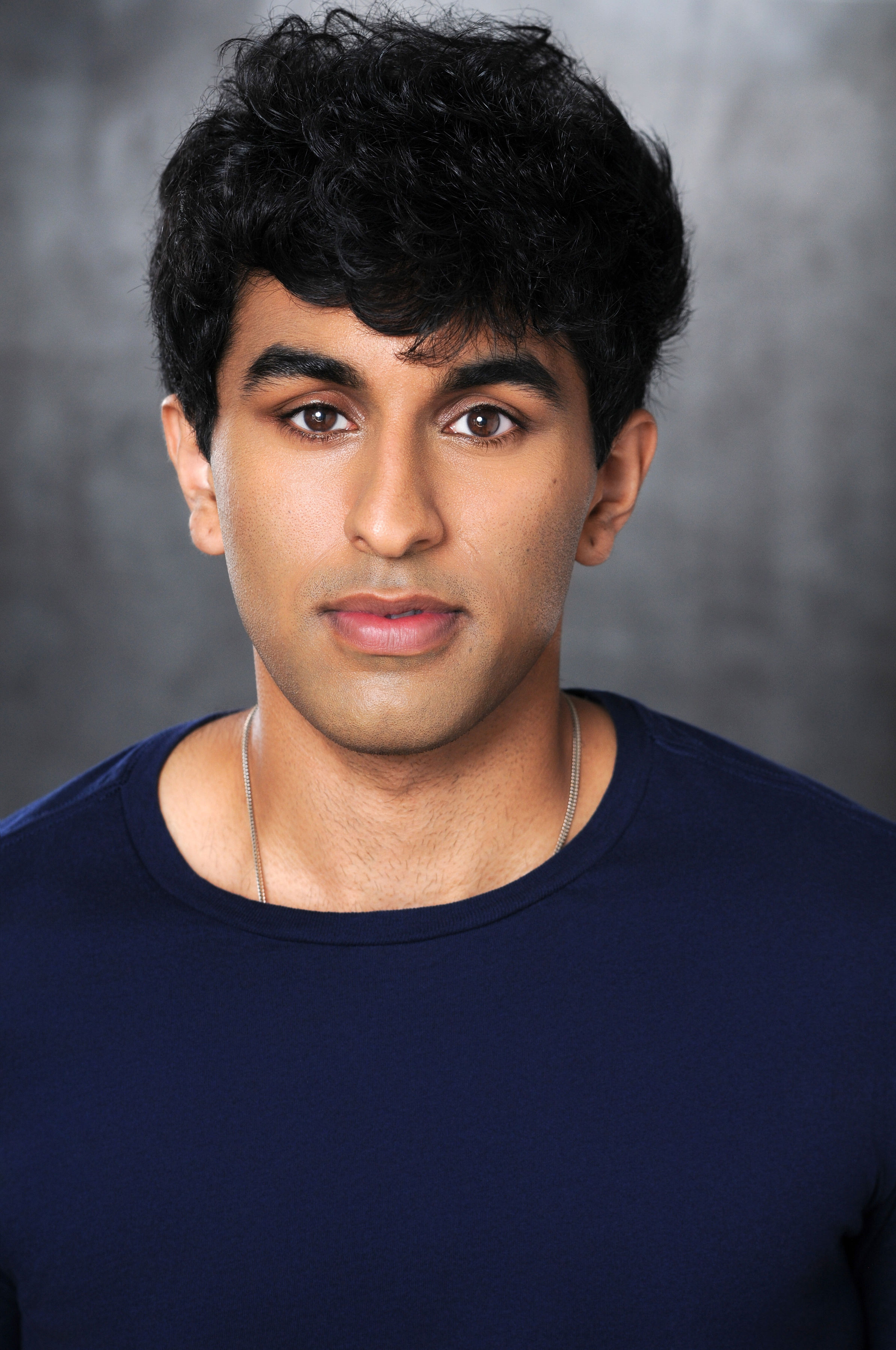 Om Raina, headshot